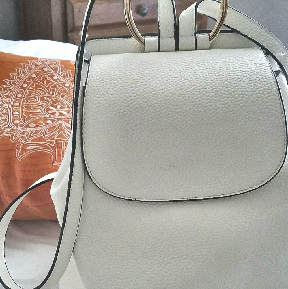 SOLD. White Atractive and Functional Backpack.